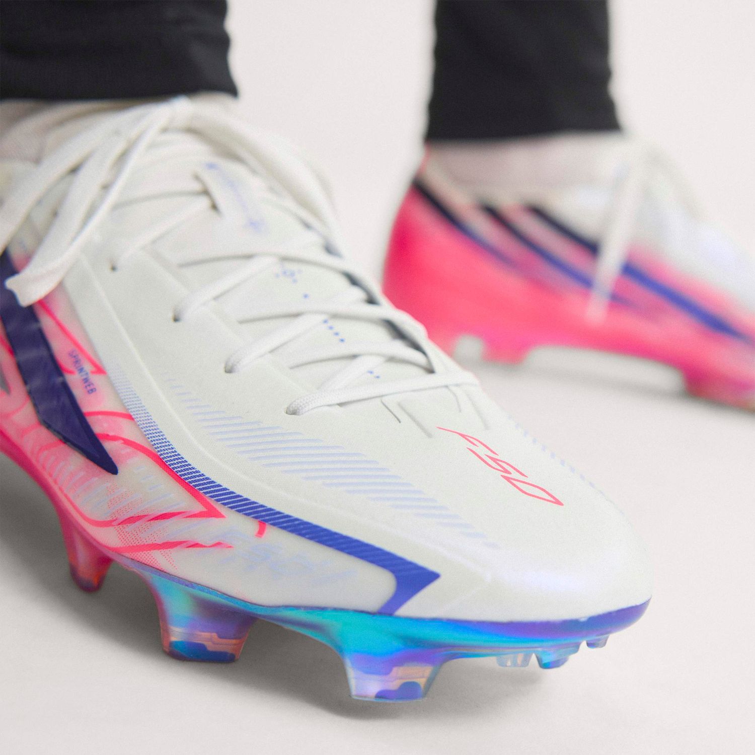 F50 HYPERFAST ELITE FG (WHITE/PURPLE/ SOLAR TURBO)