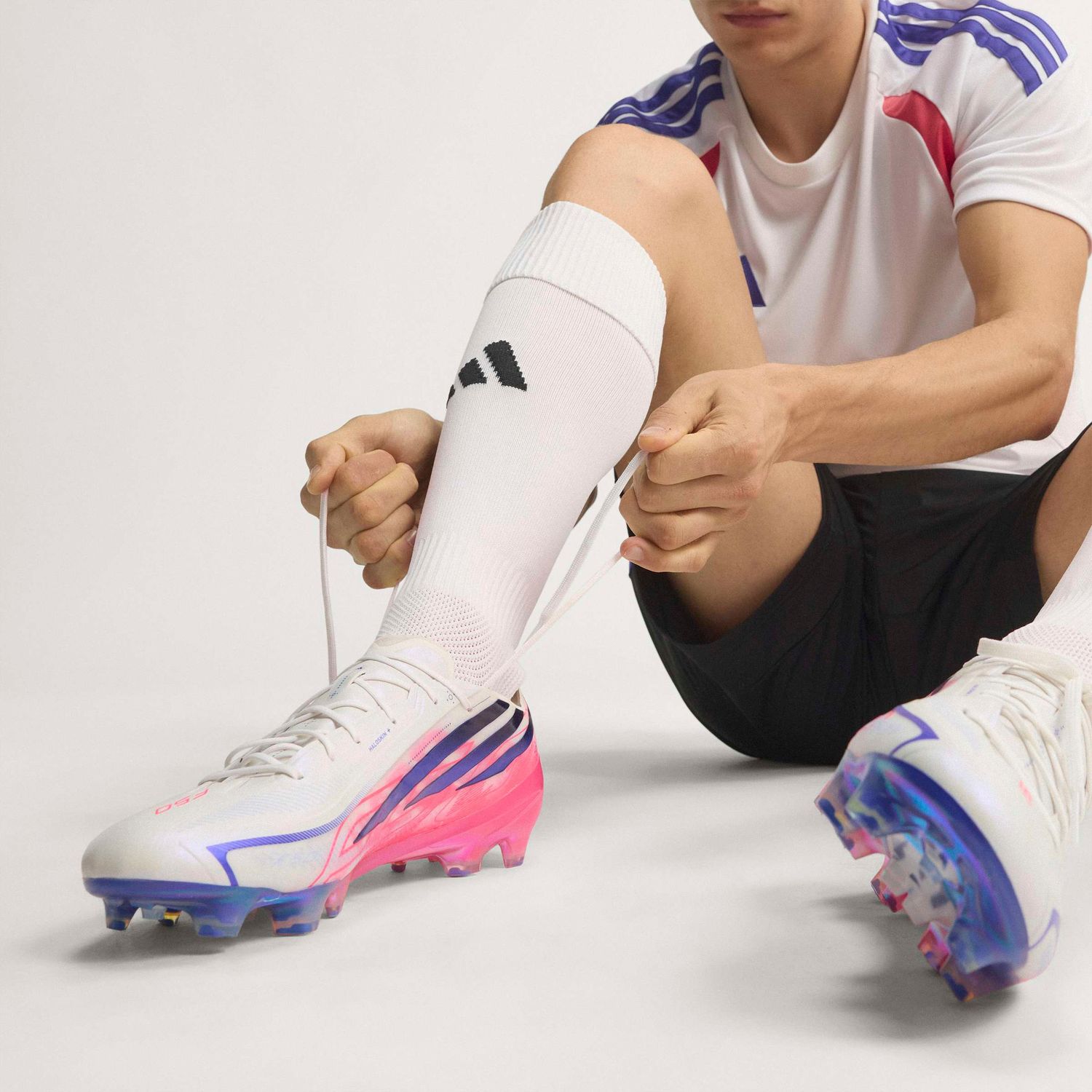 F50 HYPERFAST ELITE FG (WHITE/PURPLE/ SOLAR TURBO)