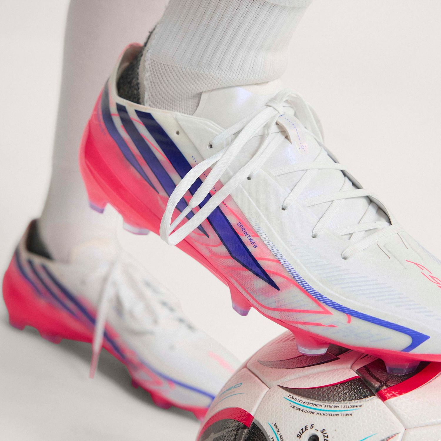 F50 HYPERFAST PRO FG (WHITE/PURPLE/SOLAR TURBO)