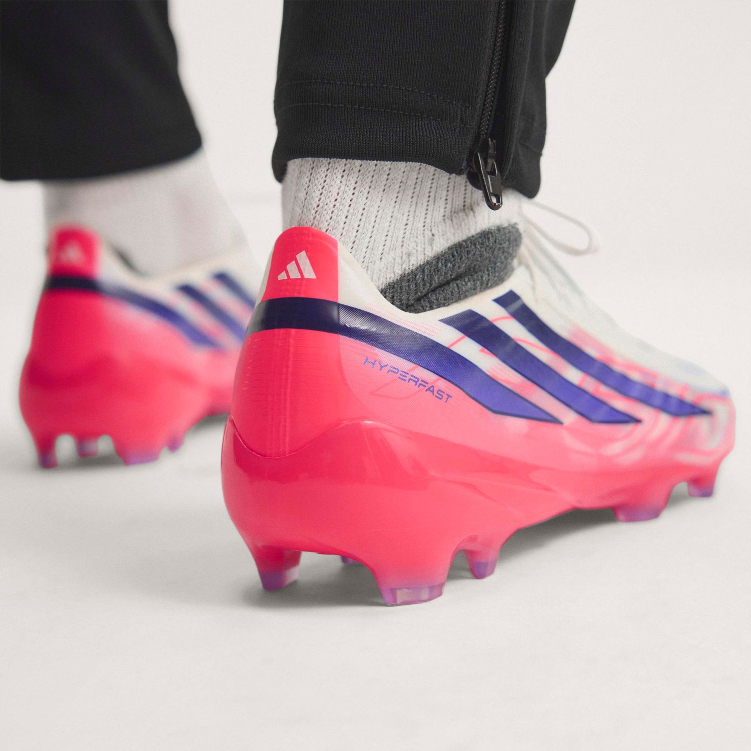 F50 HYPERFAST PRO FG (WHITE/PURPLE/SOLAR TURBO)