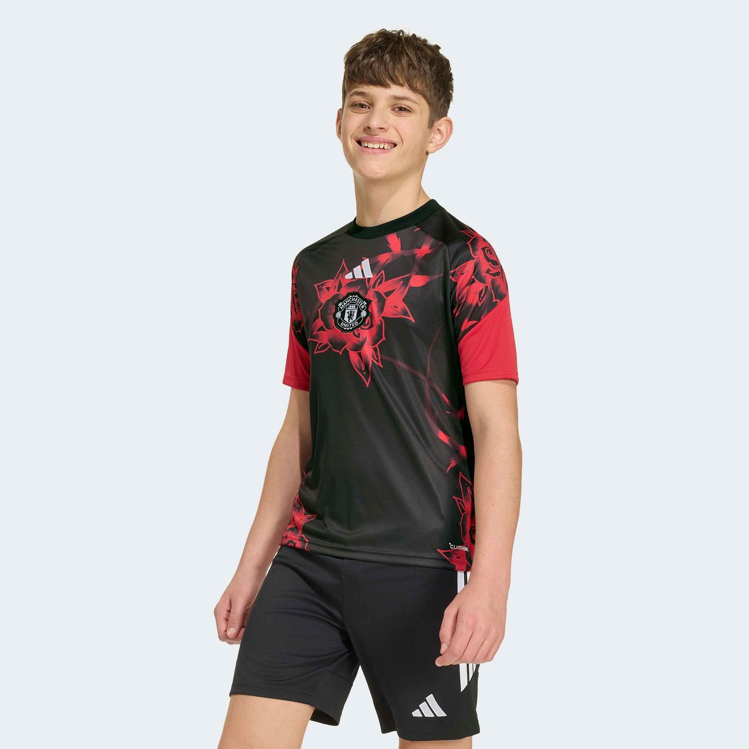 MANCHESTER UNITED 26/27 PREMATCH JERSEY YOUTH (BLACK/RED)