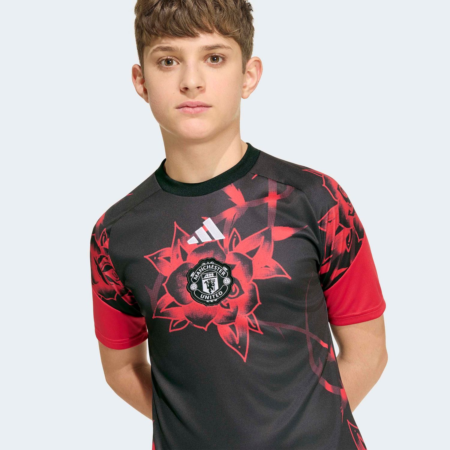 MANCHESTER UNITED 26/27 PREMATCH JERSEY YOUTH (BLACK/RED)