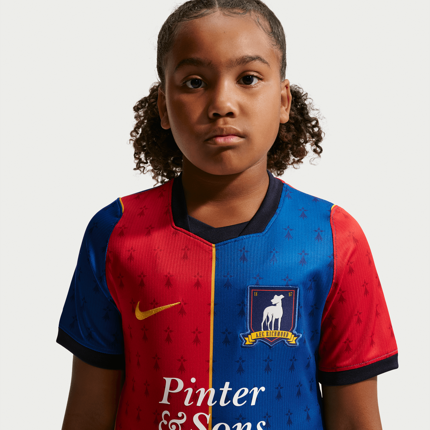 TED LASSO AFC RICHMOND 2026 HOME JERSEY YOUTH (BLUE/RED)