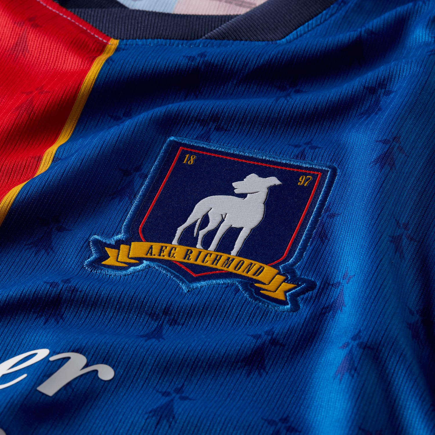 TED LASSO AFC RICHMOND 2026 HOME JERSEY YOUTH (BLUE/RED)