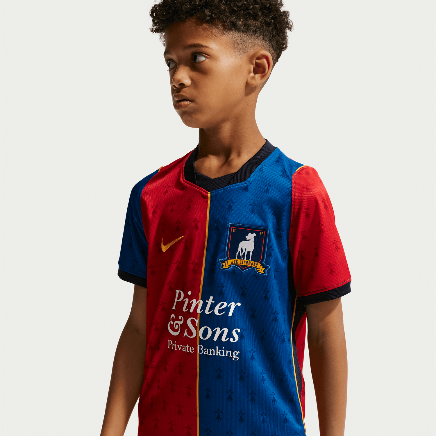 TED LASSO AFC RICHMOND 2026 HOME JERSEY YOUTH (BLUE/RED)