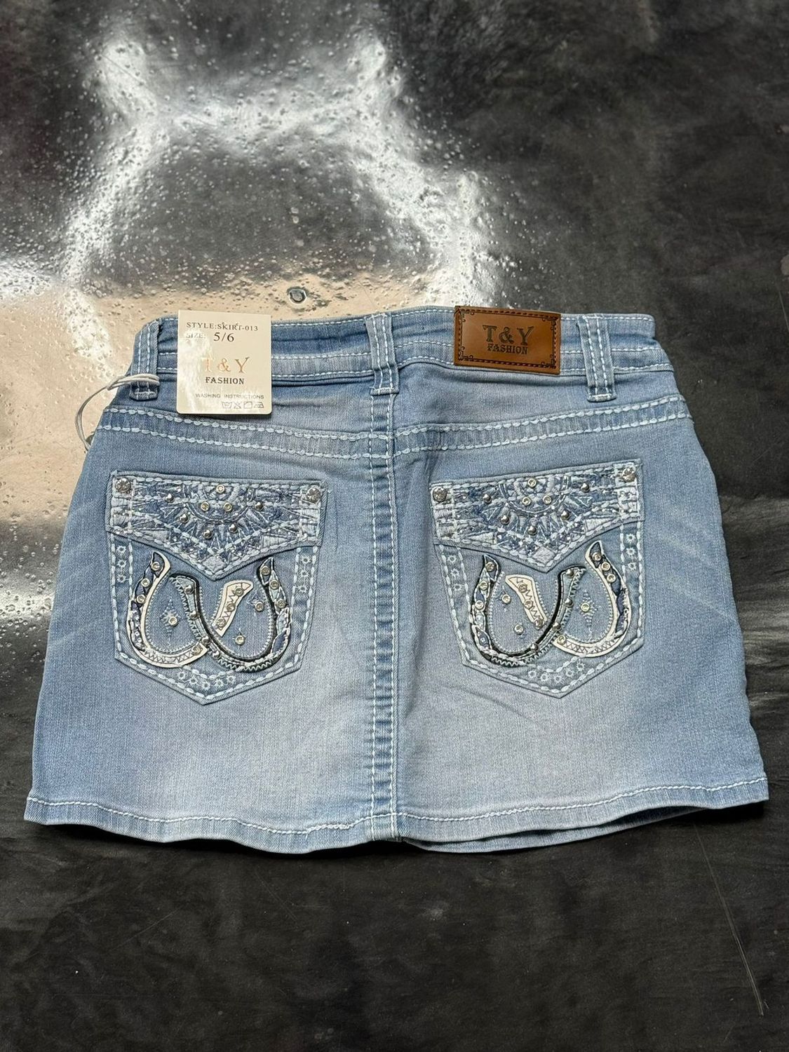 light wash gem skirt