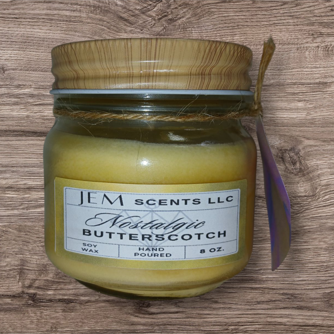 Nostalgic Butterscotch soy candle in glass jar with lid