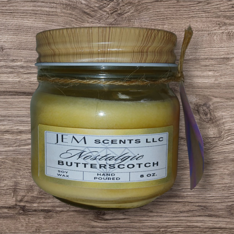 Nostalgic Butterscotch soy candle in glass jar with lid