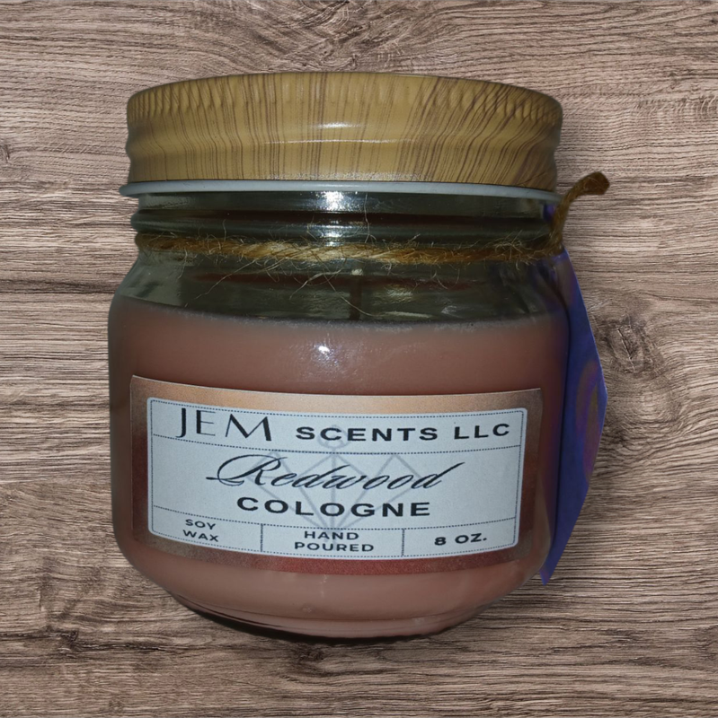 Natural soy wax Redwood Cologne candle in glass jar with lid