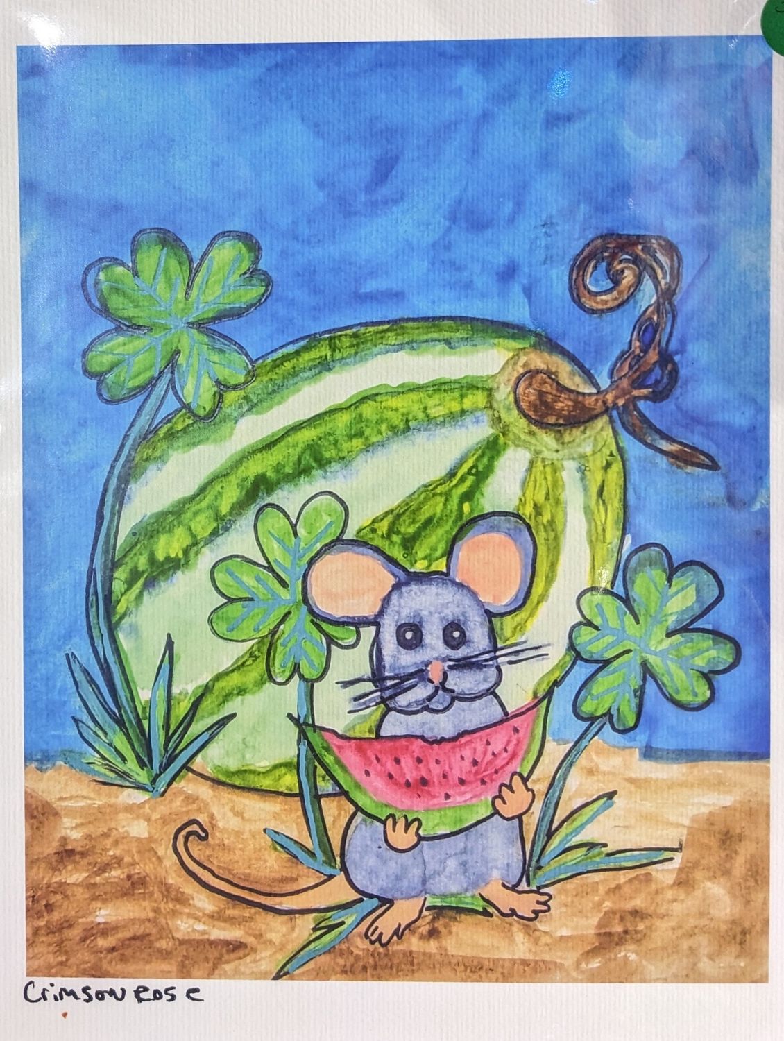 Mouse with watermelon on the vine