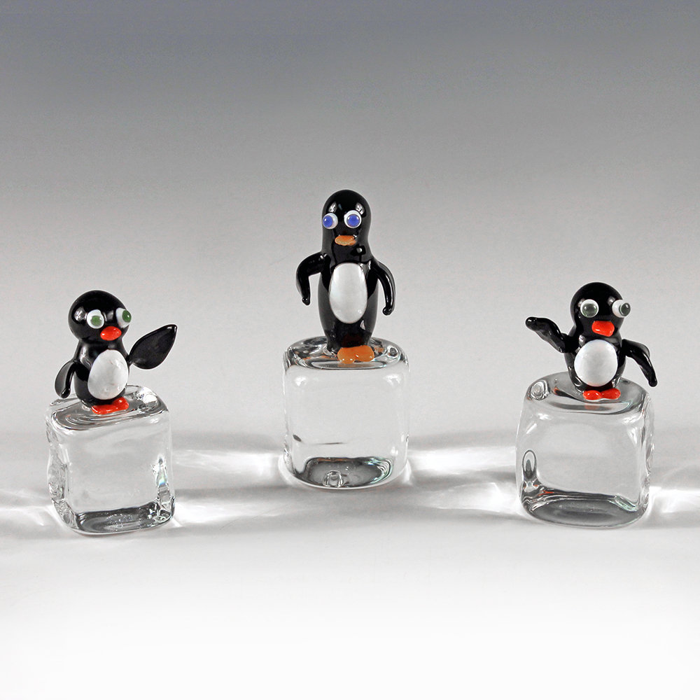Penguin on Ice Cube