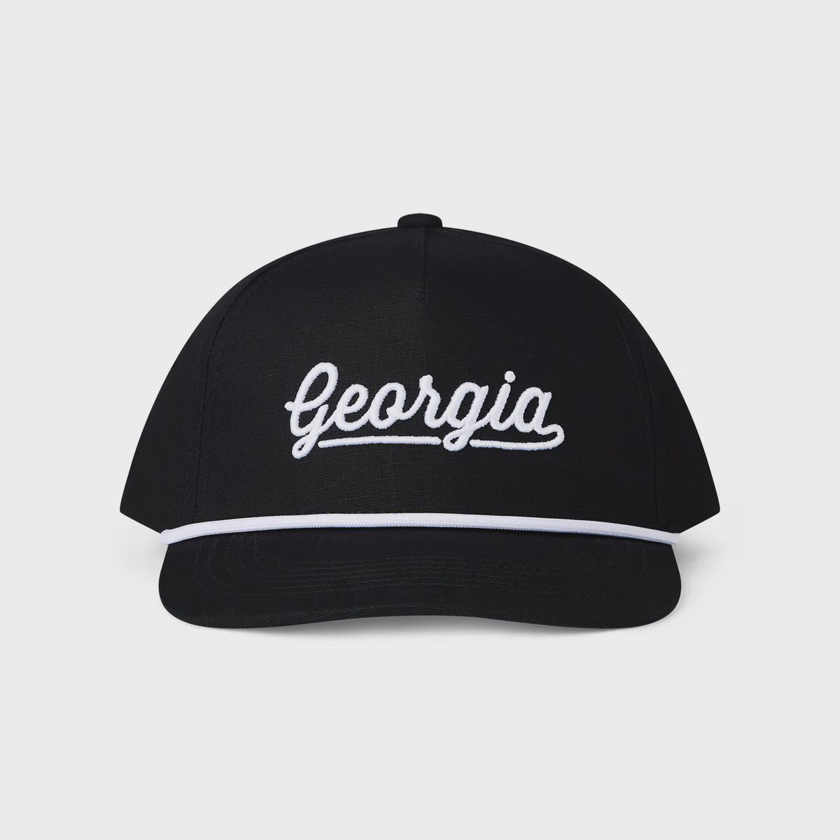 black ball cap with the word Georgia in cursive in white on front, white cord across bill