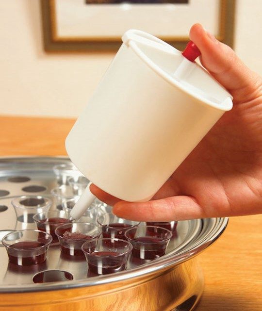 COMMUNION- CUP FILLER- BUTTON RELEASE