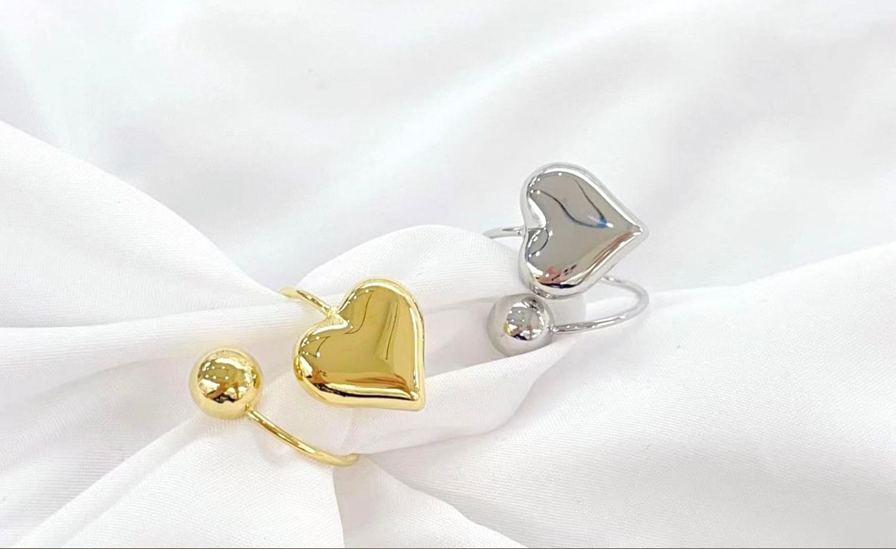 Anello regolabile cuori bombati acciaio