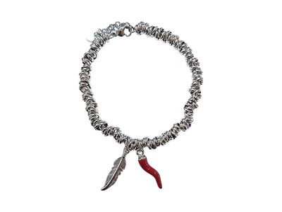Braccialetto nodino acciaio corno e piuma Braccialetto nodino acciaio corno e piuma