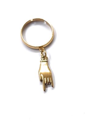 Anello regolabile acciaio mano corna dorato pendente