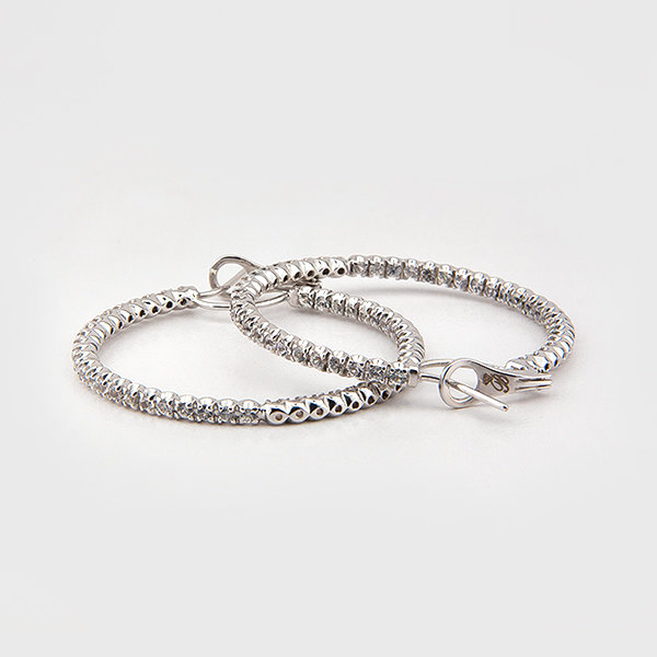 White sapphire hoop earrings in 14k white gold