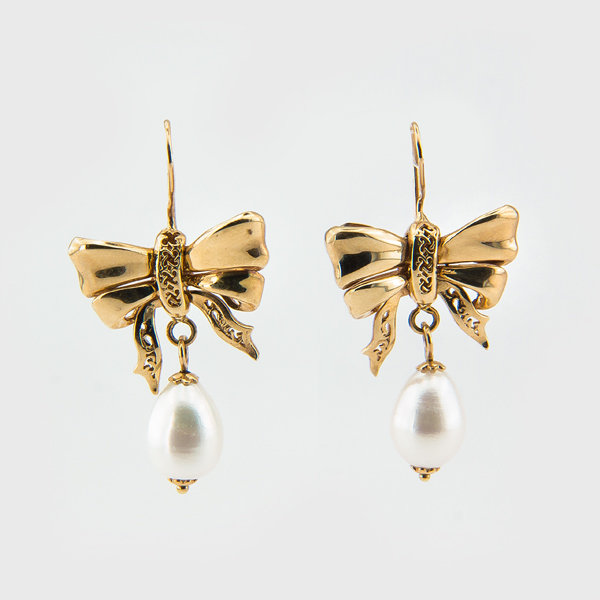 Pearl bowtie earrings in 14k yellow gold