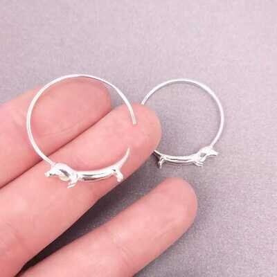 Sterling Silver -  Mid-sized sterling hoop earrings