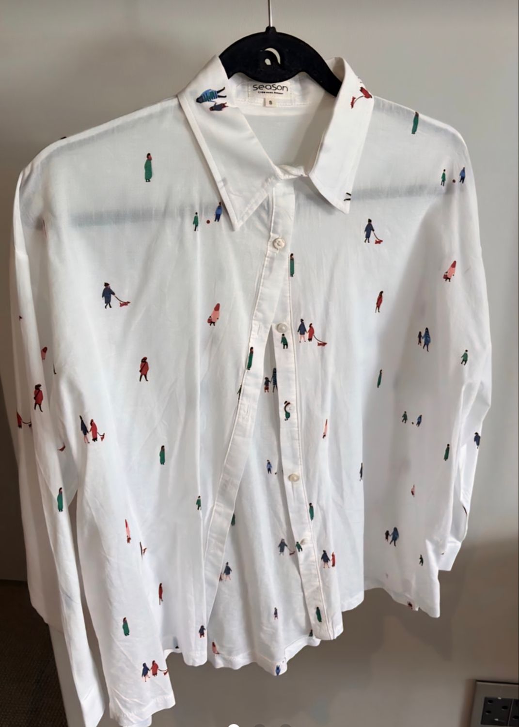 White Shirt with Figurines Walking Dogs