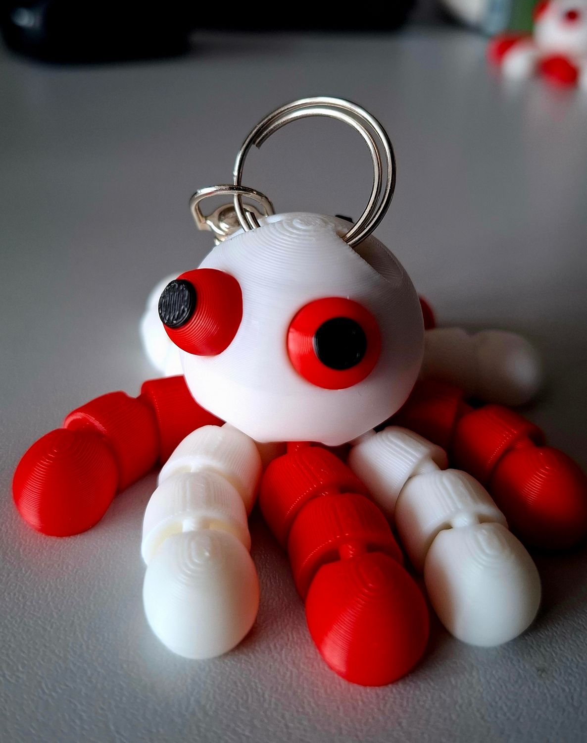 Rood en wit Octopus sleutelhanger