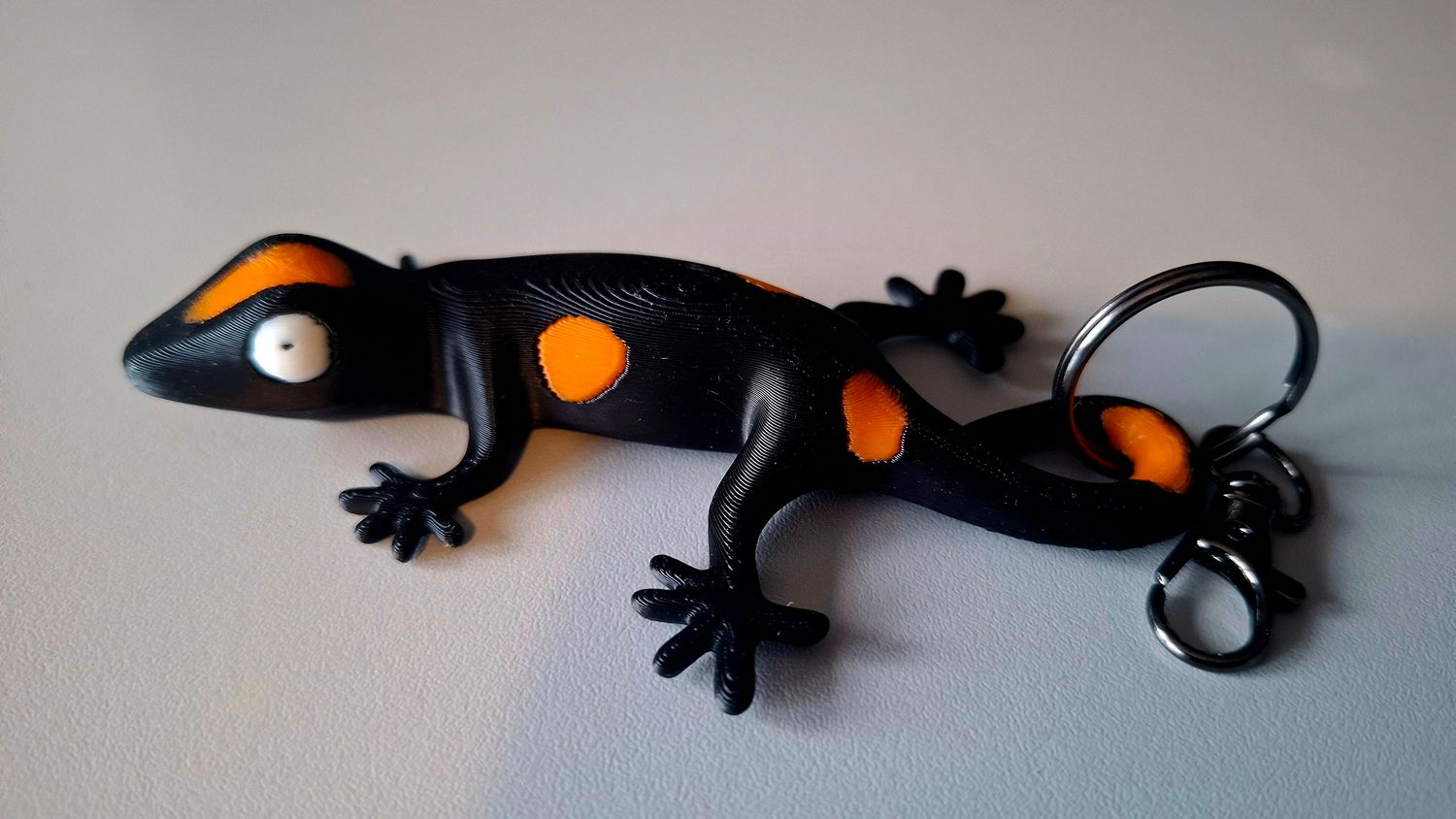 Gekko zwart met oranje