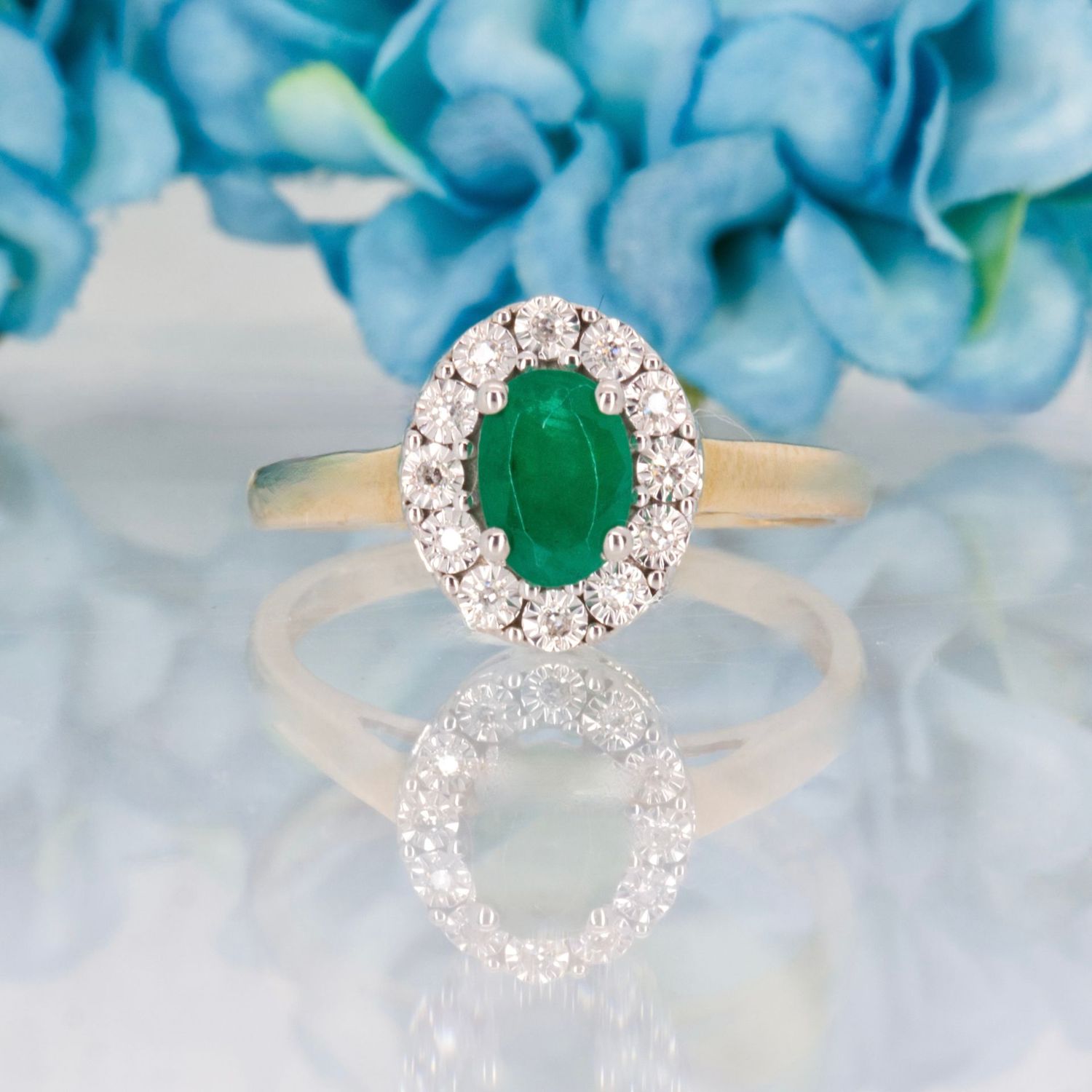 9ct Yellow Gold Oval Cut Emerald & Round Brilliant Cut Diamond Halo Cluster Ring
