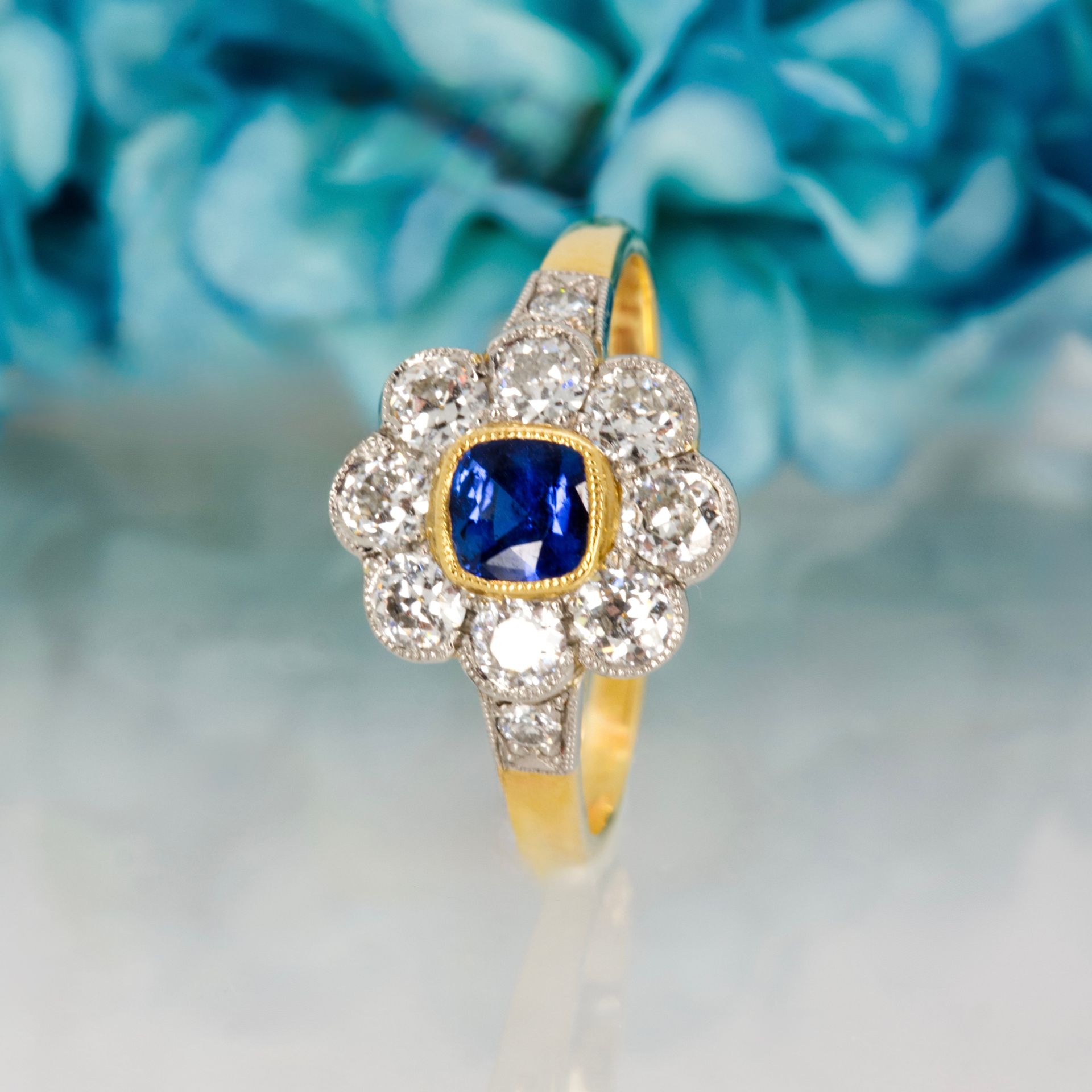 Pre-Loved 18ct Yellow Gold & Platinum Cushion Cut Sapphire & Diamond Daisy Cluster Ring
