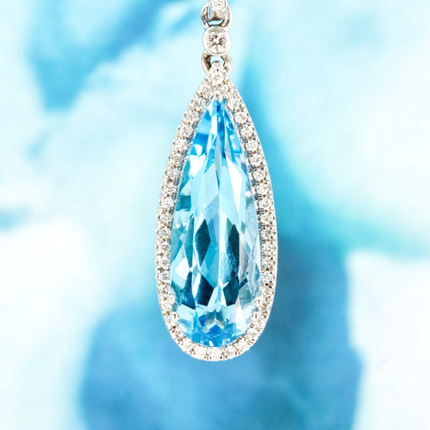 9ct White Gold Pear Shaped Blue Topaz & Round Brilliant Cut Diamond Pendant & Chain