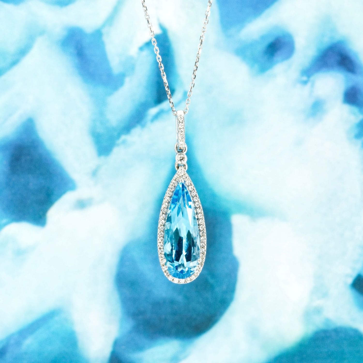 9ct White Gold Pear Shaped Blue Topaz & Round Brilliant Cut Diamond Pendant & Chain