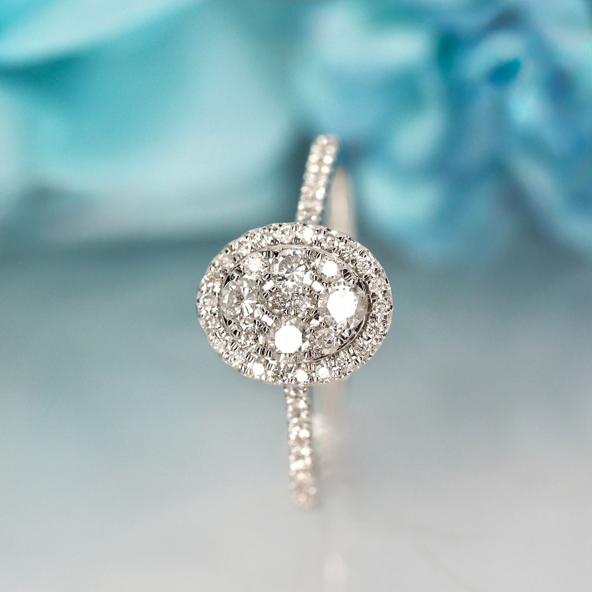 9ct White Gold 0.55ct Round Brilliant Cut Diamond Oval Cluster Ring