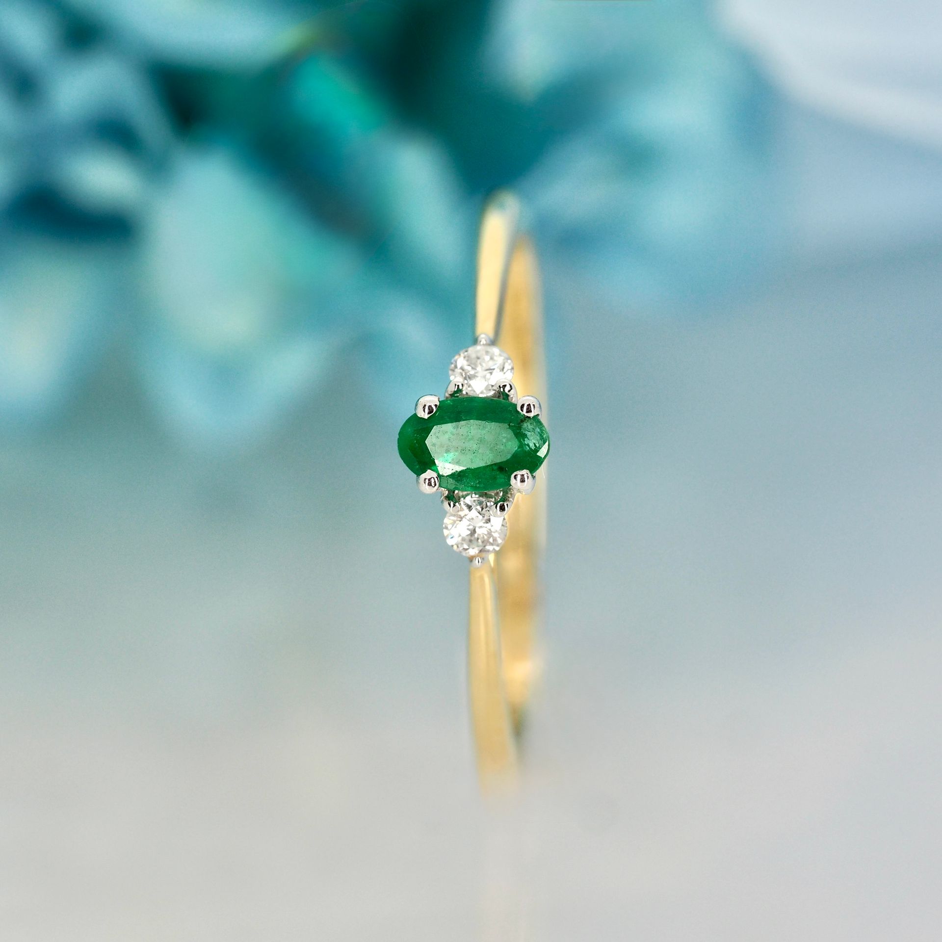 9ct Yellow Gold Oval Cut Emerald & Round Brilliant Cut Diamond Trilogy Ring