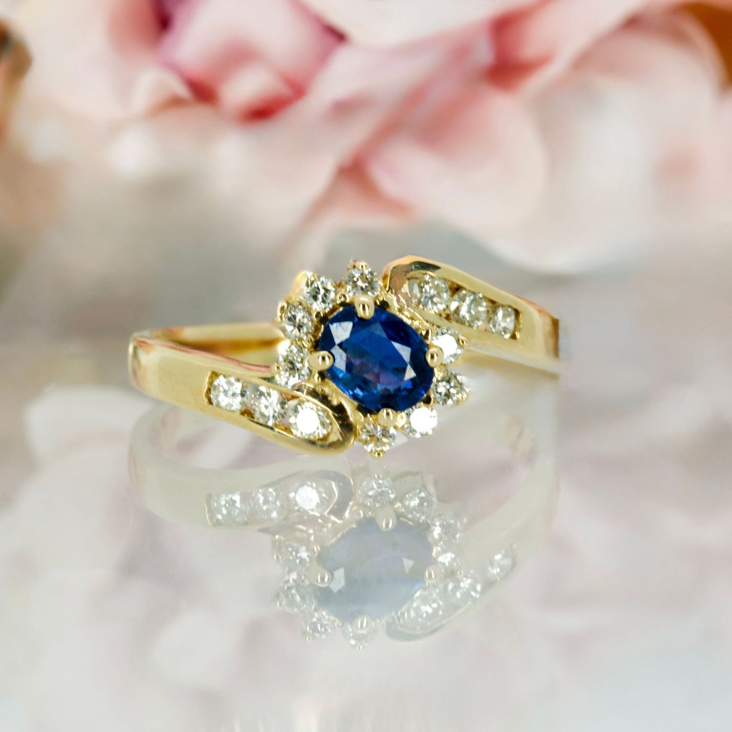 Pre-Loved 14ct Yellow Gold Oval Cut Sapphire & Diamond Cluster Crossover Ring