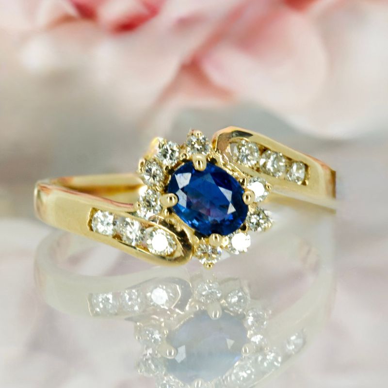 Pre-Loved 14ct Yellow Gold Oval Cut Sapphire & Diamond Cluster Crossover Ring