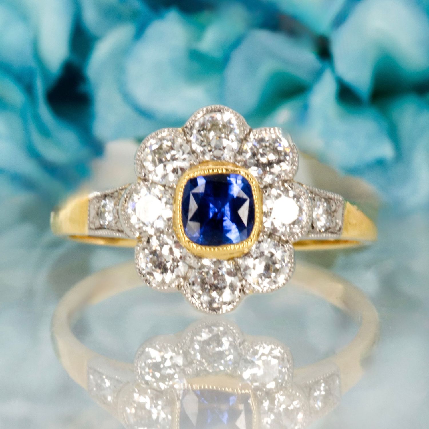 Pre-Loved 18ct Yellow Gold & Platinum Cushion Cut Sapphire & Diamond Daisy Cluster Ring