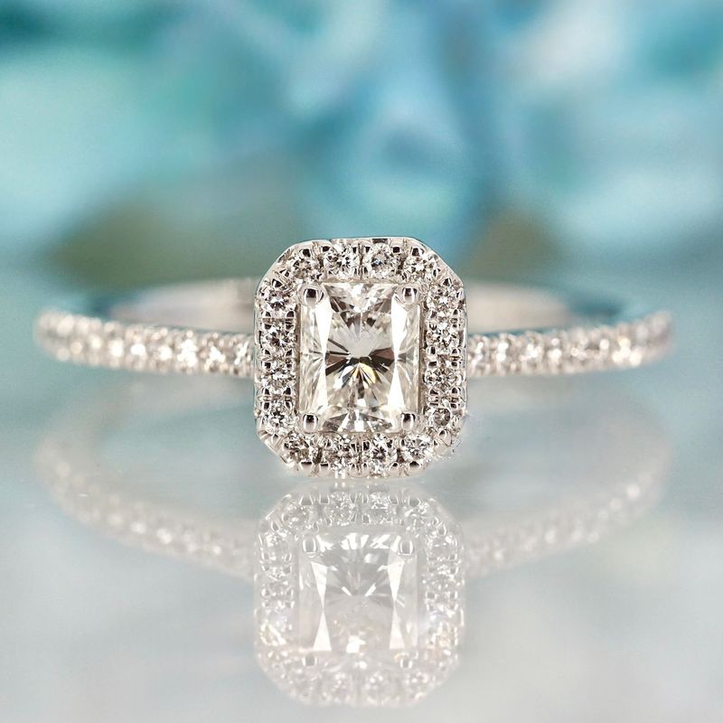 Platinum 0.54ct Emerald Cut & Round Brilliant Cut Diamond Octagonal Halo Cluster Ring