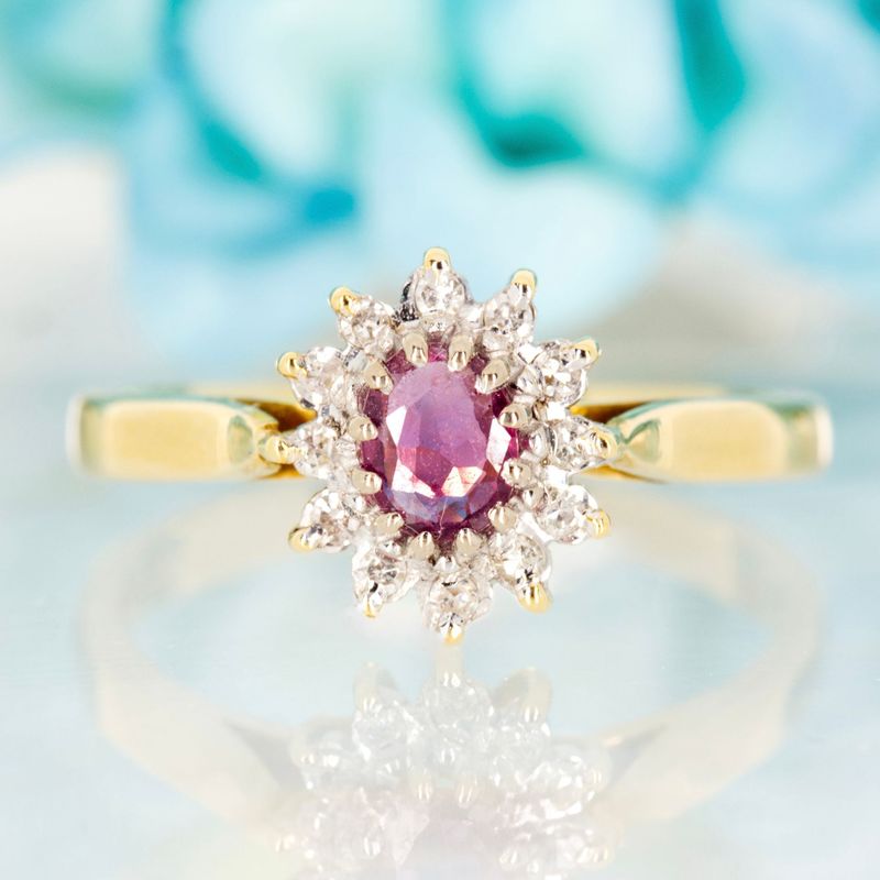 Pre-Loved 18ct Yellow Gold Oval Cut Ruby & Round Brilliant Cut Diamond Cluster Ring