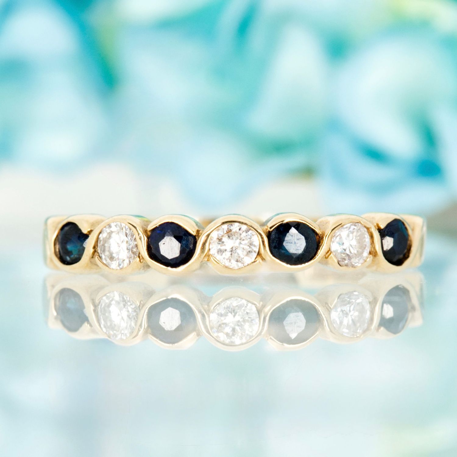 Pre-Loved 9ct Yellow Gold Round Cut Sapphire & Diamond Half Eternity Ring