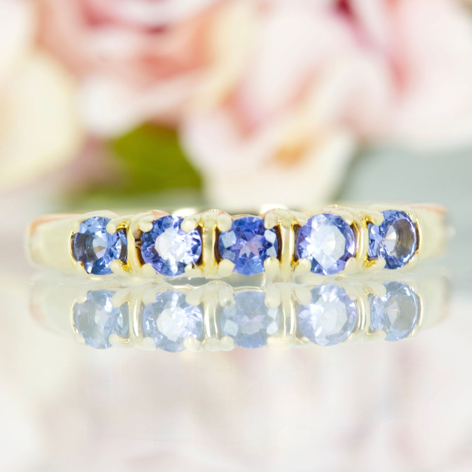 Pre-Loved 18ct Yellow Gold Round Cut Tanzanite Five Stone Half Eternity Ring