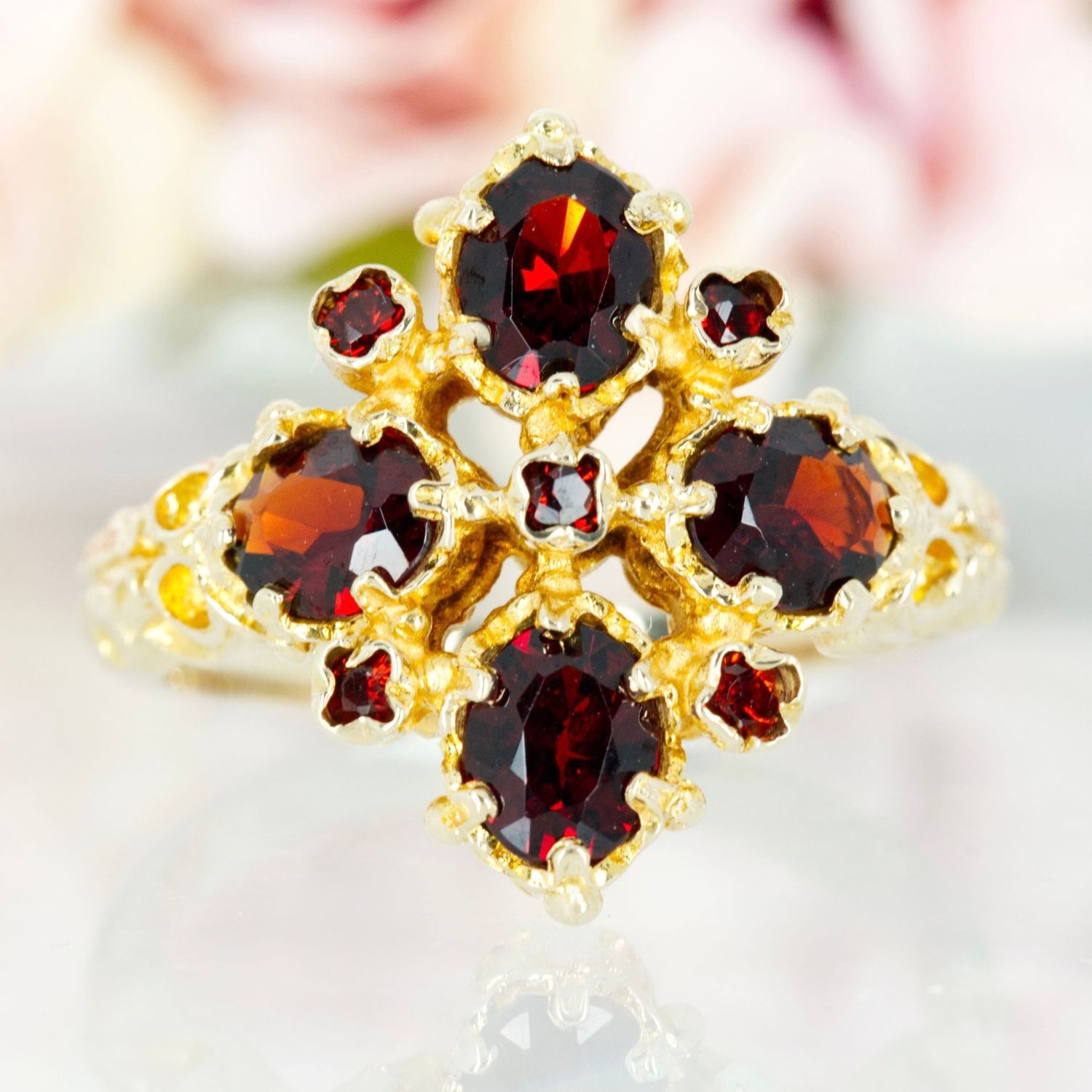 Pre-Loved 9ct Yellow Gold Oval & Round Cut Garnet Cluster Ring