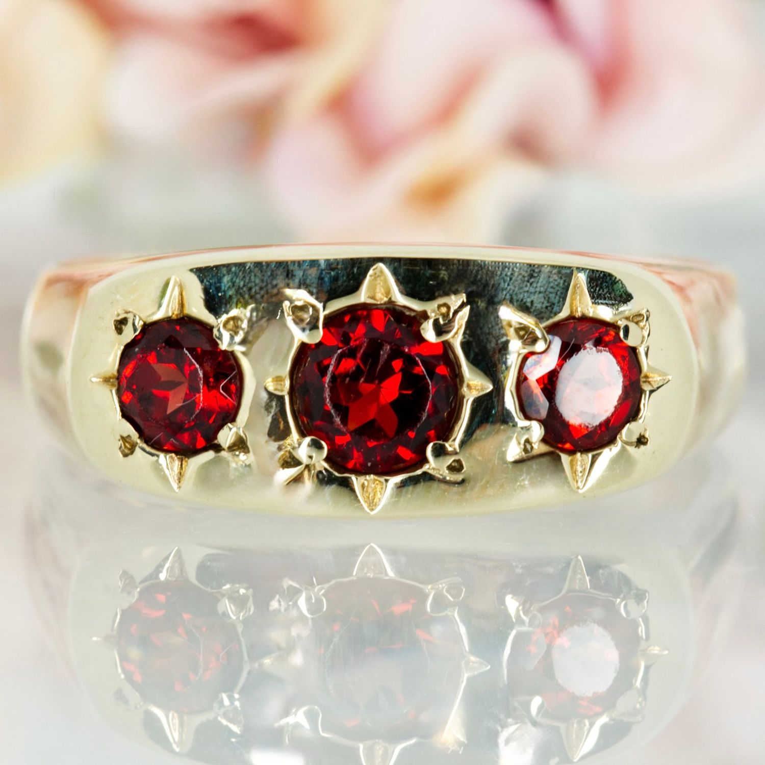 Pre-Loved 9ct Yellow Gold Round Cut Garnet Trilogy Ring