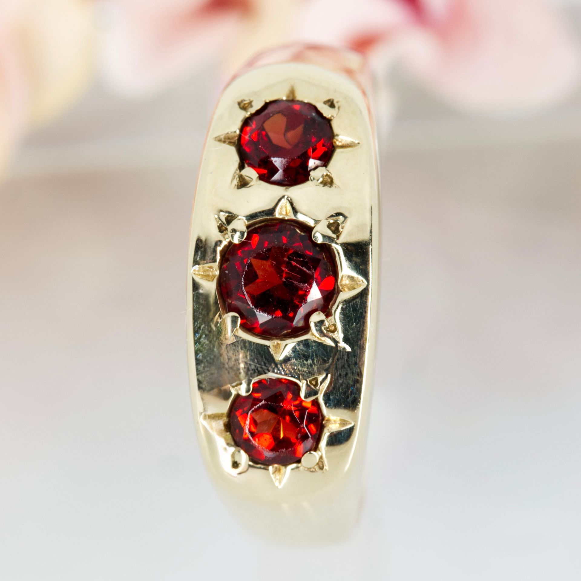 Pre-Loved 9ct Yellow Gold Round Cut Garnet Trilogy Ring