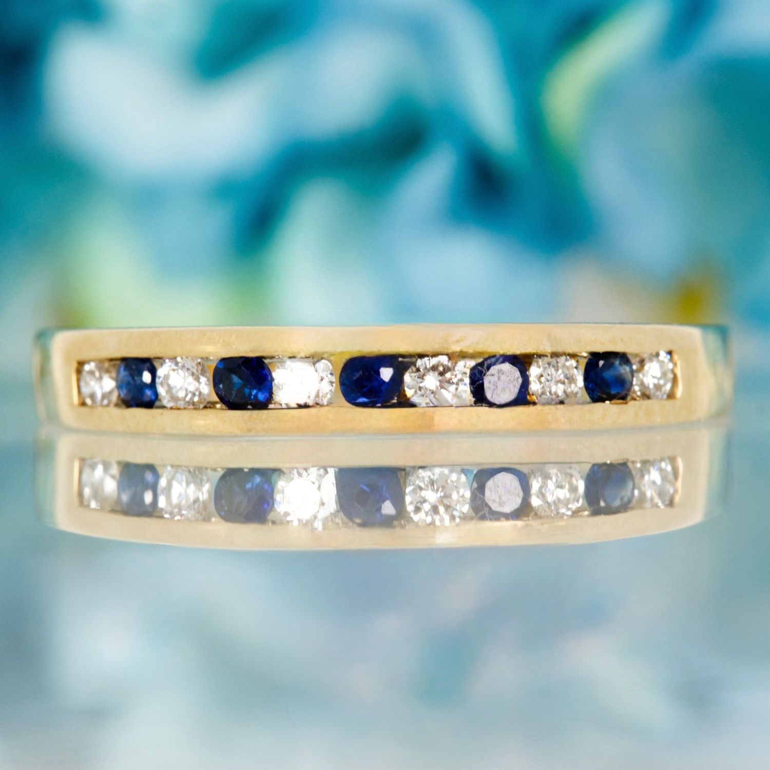 9ct Yellow Gold Round Cut Sapphire & Diamond Channel Set Half Eternity Ring