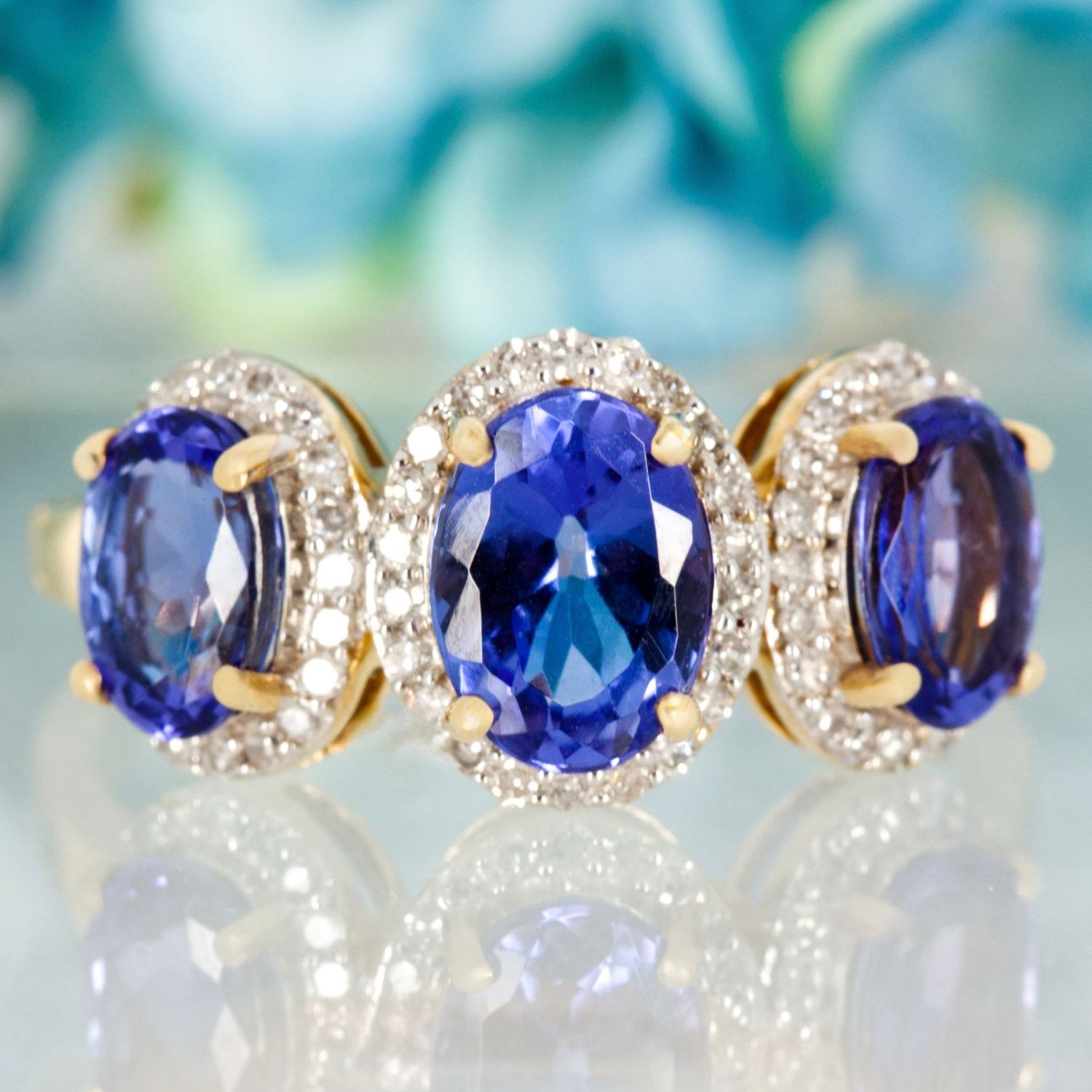 Pre-Loved 14ct Yellow Gold Oval Cut Tanzanite & Round Cut Moissanite Triple Cluster Ring