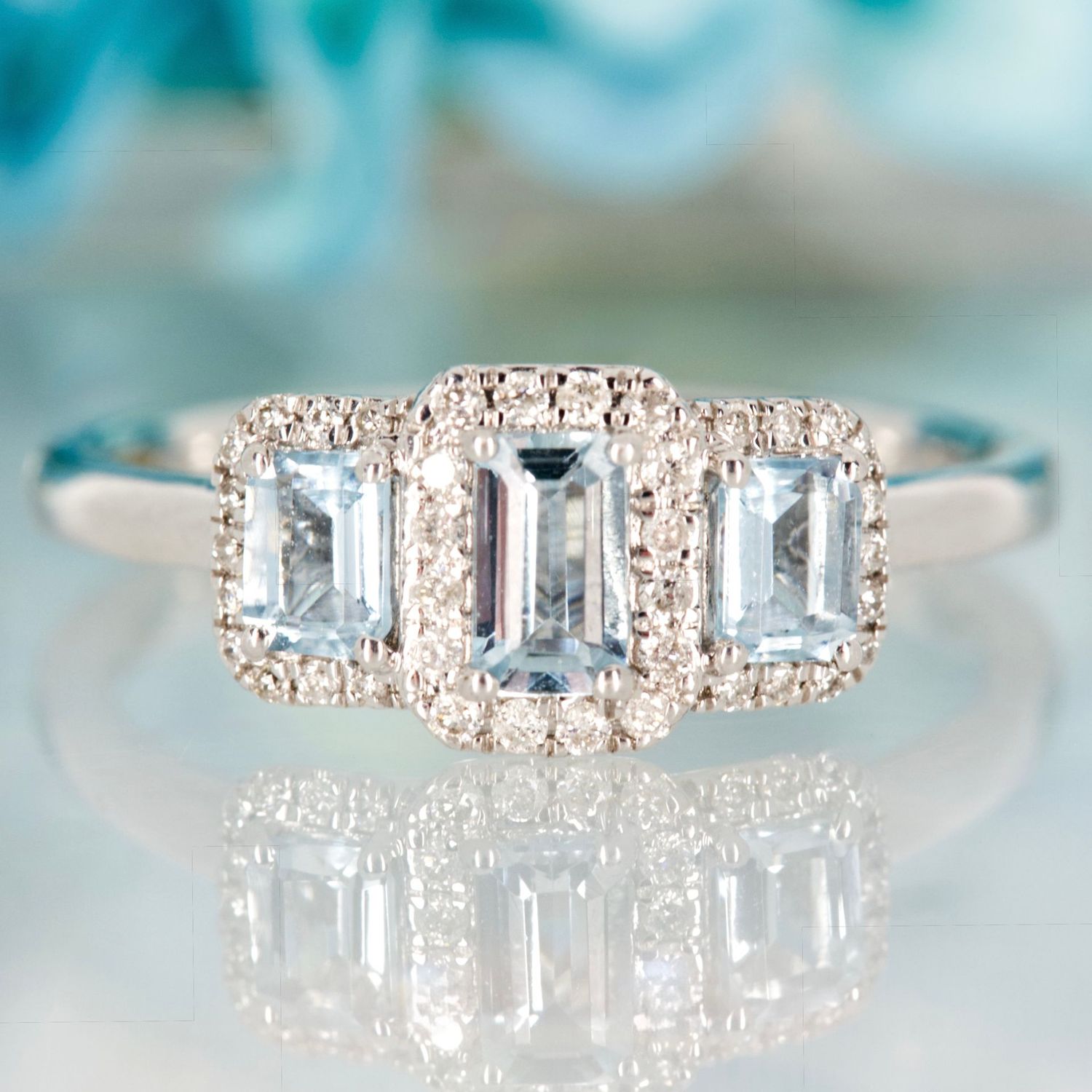 9ct White Gold Octagonal Cut Aquamarine & Round Brilliant Cut Diamond Triple Cluster Ring