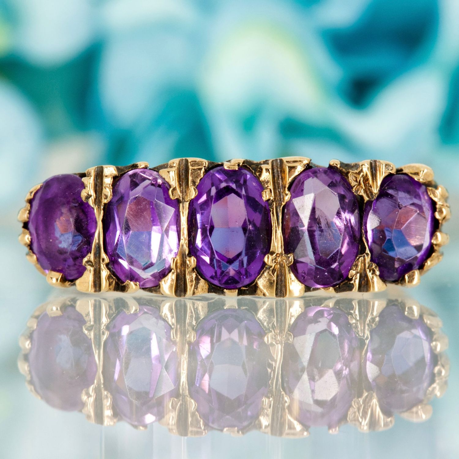 Pre-Loved 9ct Yellow Gold Oval Cut Amethyst Five Stone Ring