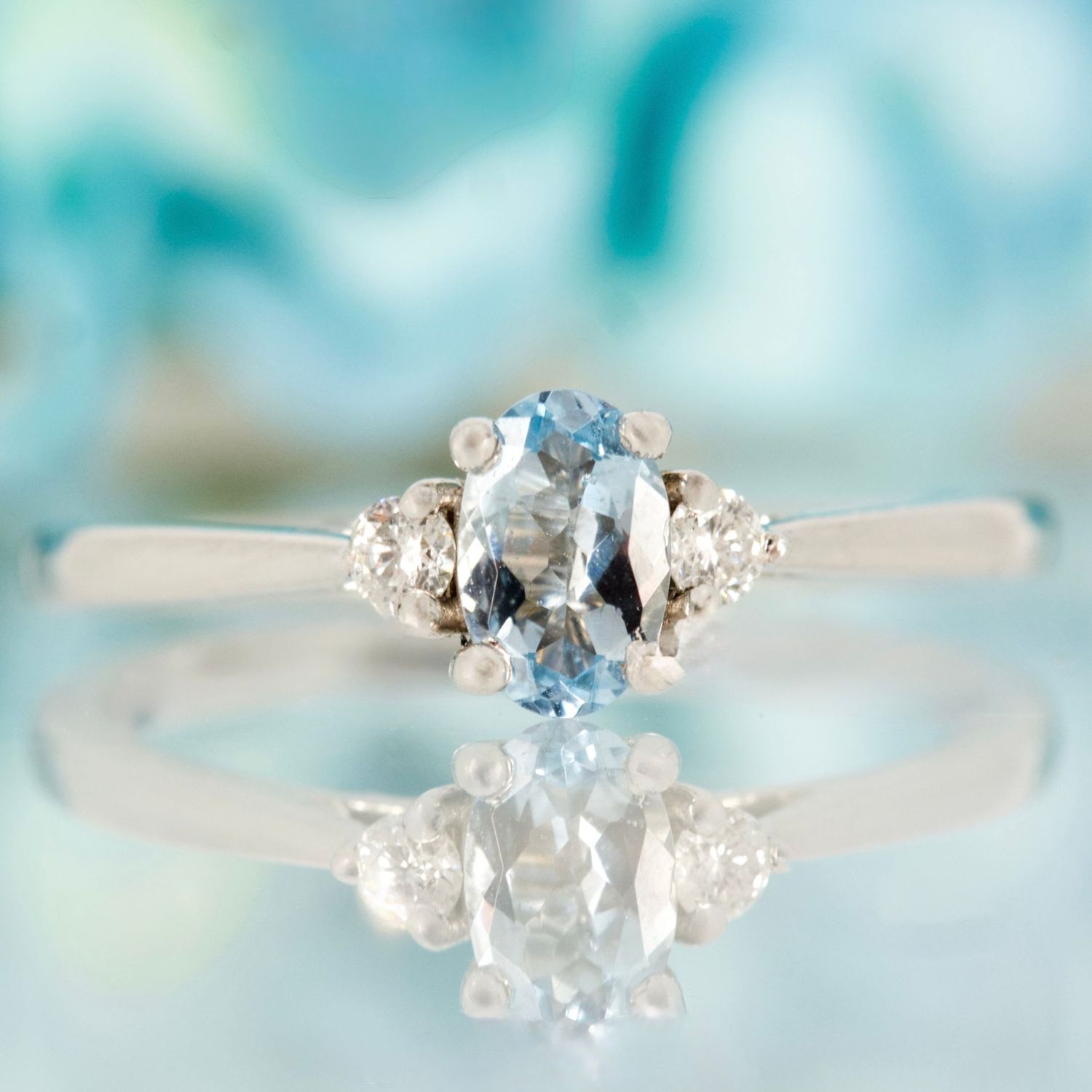 9ct White Gold Oval Cut Aquamarine & Round Brilliant Cut Diamond Trilogy Ring
