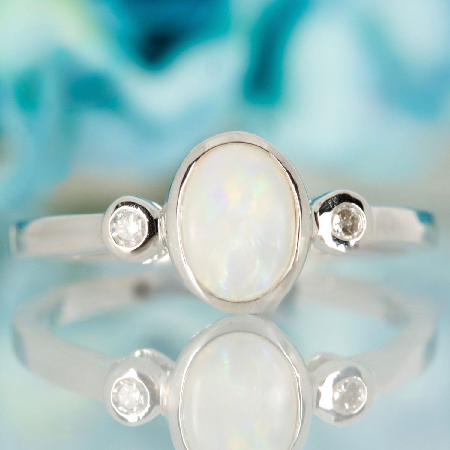 9ct White Gold Oval Opal & Round Brilliant Cut Diamond Trilogy Ring