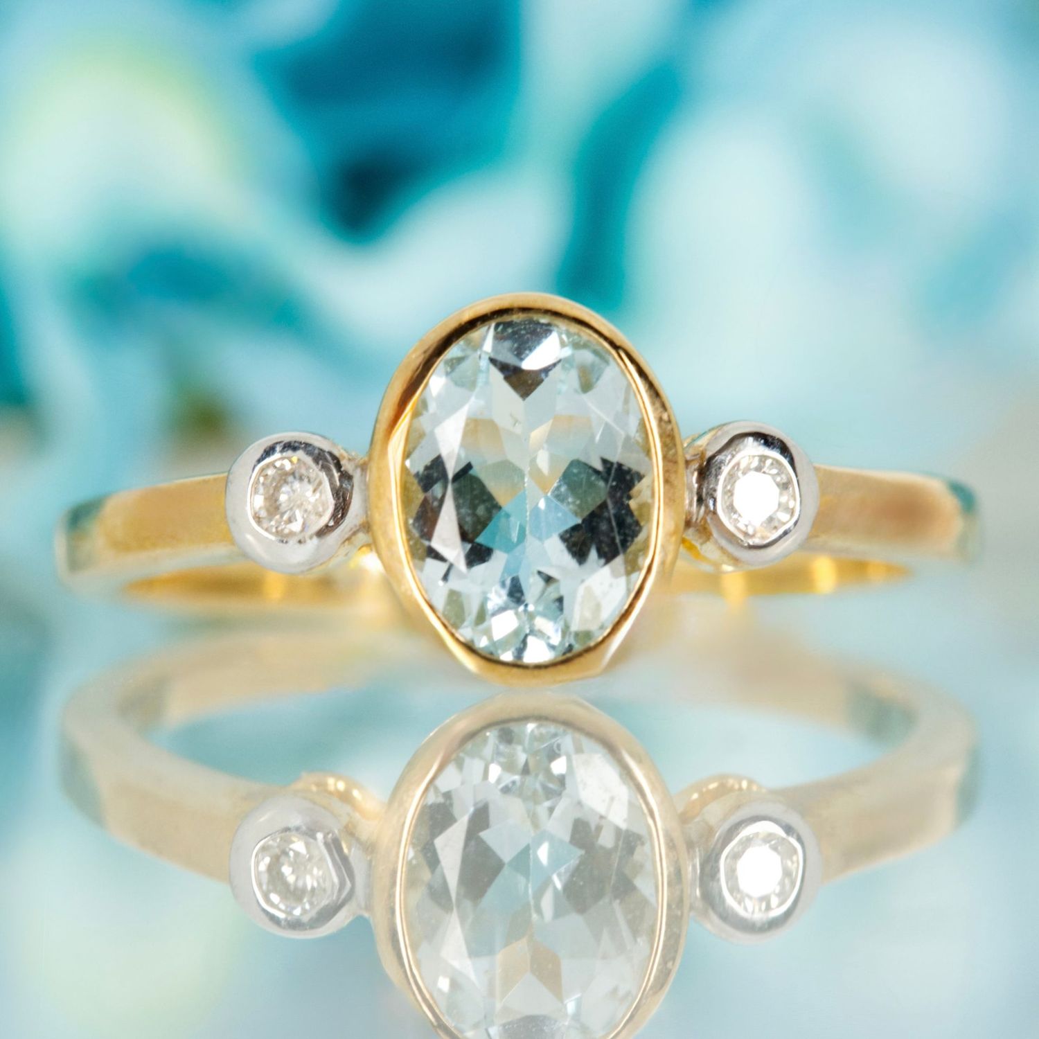 9ct Yellow Gold Oval Cut Aquamarine & Round Brilliant Cut Diamond Trilogy Ring