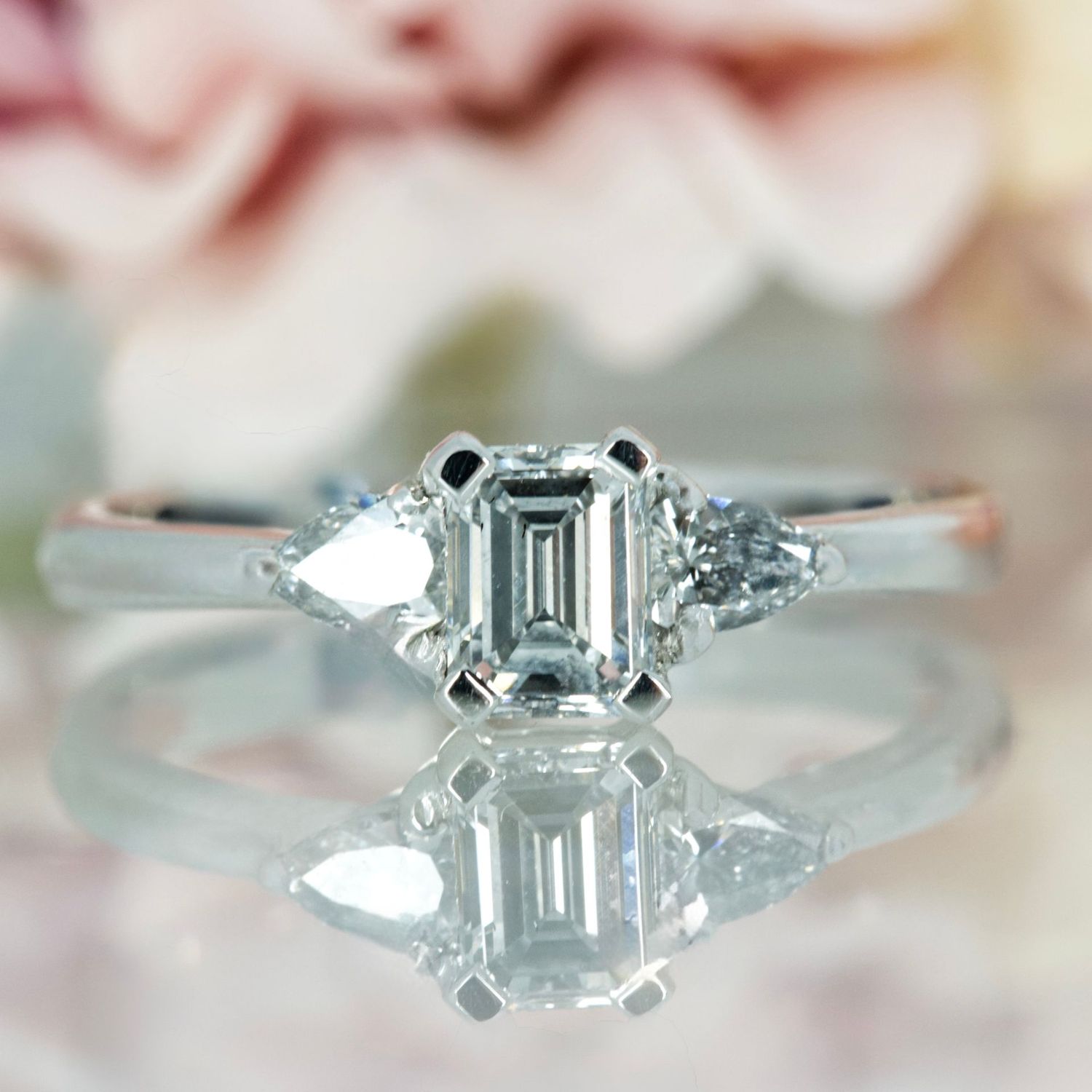 Pre-Loved 18ct White Gold 0.75ct Approx Emerald & Pear Cut Diamond Trilogy Ring